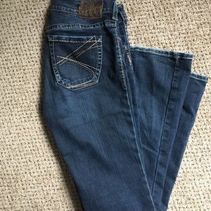 Silver bootcut women’s jeans.